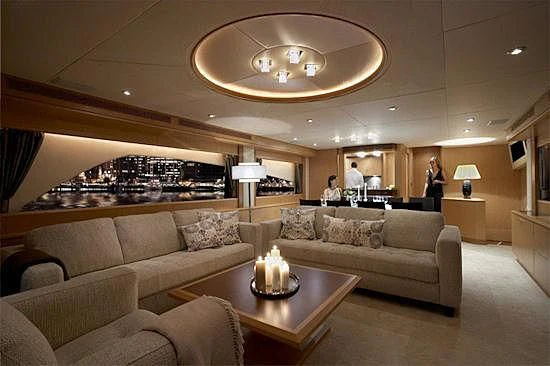 a living room with a large window aboard STELA 117 Yacht for Sale