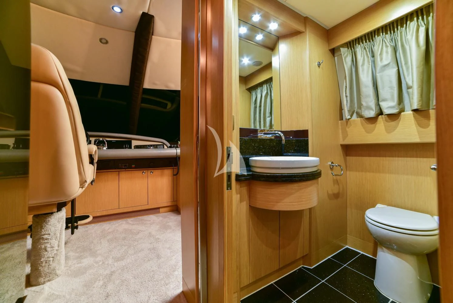 a bathroom with a sink toilet and a bathtub aboard STELA 117 Yacht for Sale