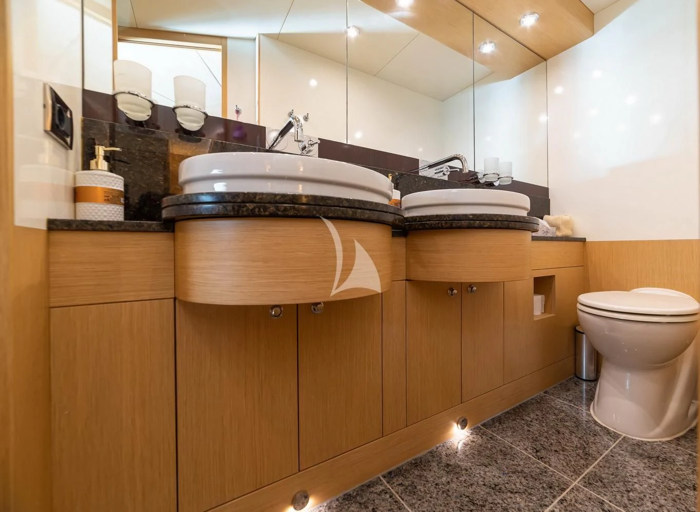 a bathroom with a sink and toilet aboard STELA 117 Yacht for Sale