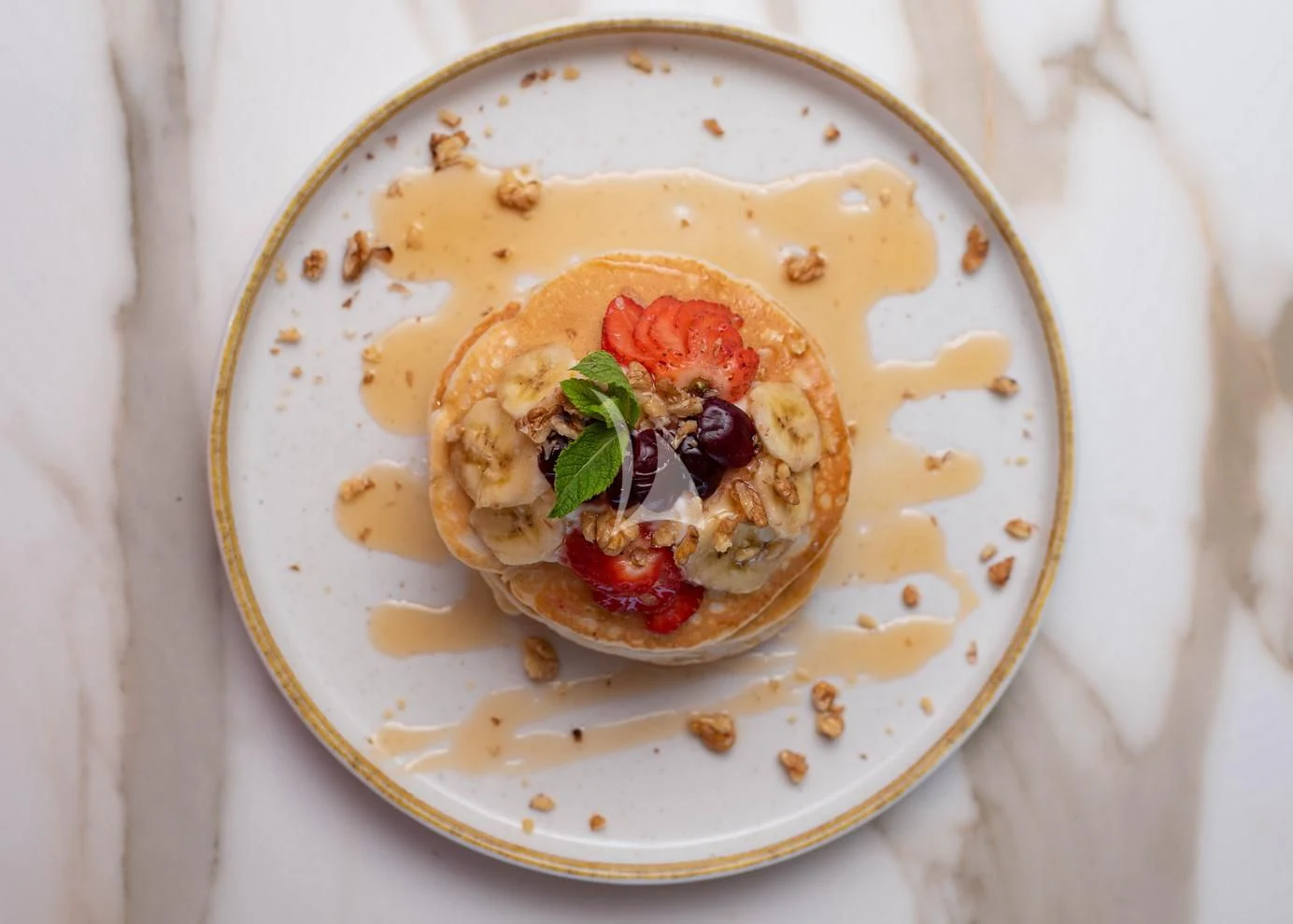 a plate of food aboard STELA 117 Yacht for Sale