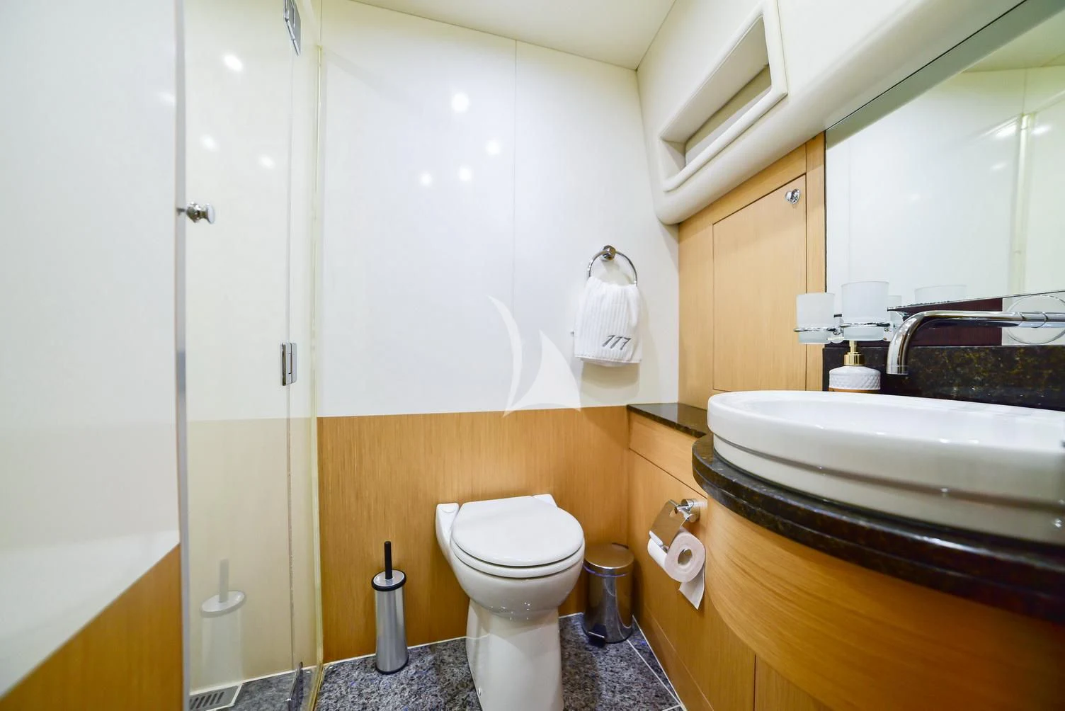 a bathroom with a toilet and sink aboard STELA 117 Yacht for Sale