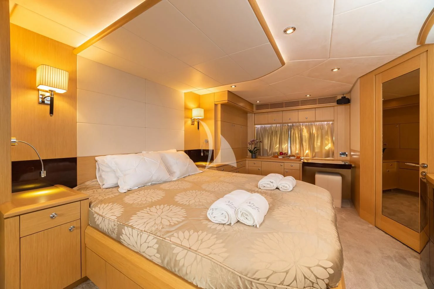 a large bedroom with a bed aboard STELA 117 Yacht for Sale