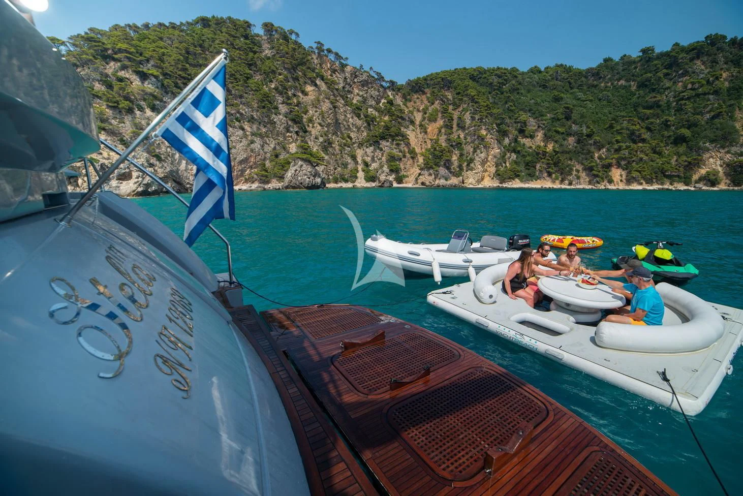 a group of people in a boat aboard STELA 117 Yacht for Sale