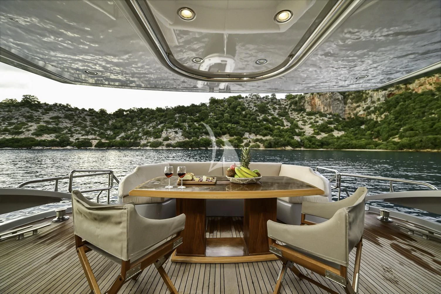 a table on a boat aboard STELA 117 Yacht for Sale