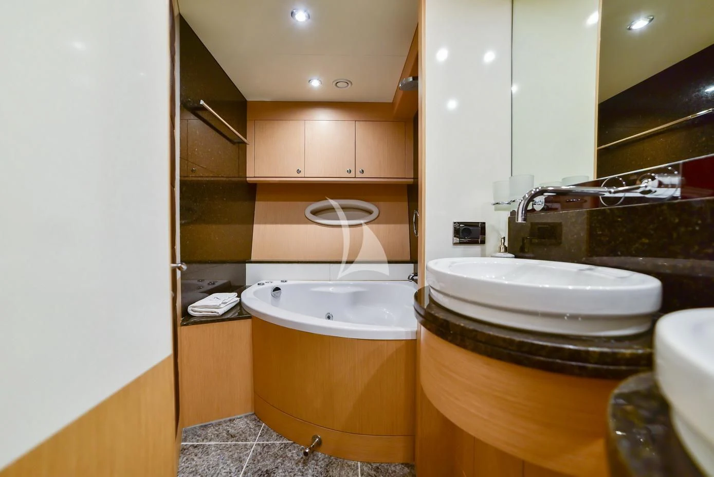 a bathroom with a sink and a bathtub aboard STELA 117 Yacht for Sale