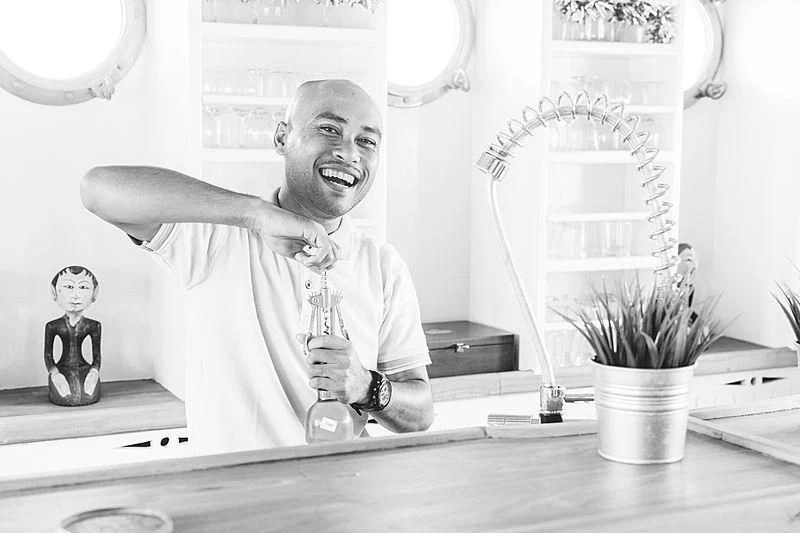 a man sitting at a desk aboard MISCHIEF Yacht for Sale