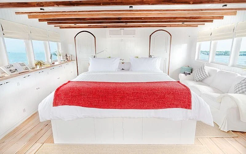 a room with two beds aboard MISCHIEF Yacht for Sale