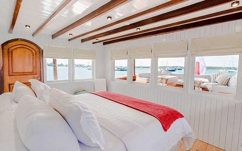 a bed in a room aboard MISCHIEF Yacht for Sale