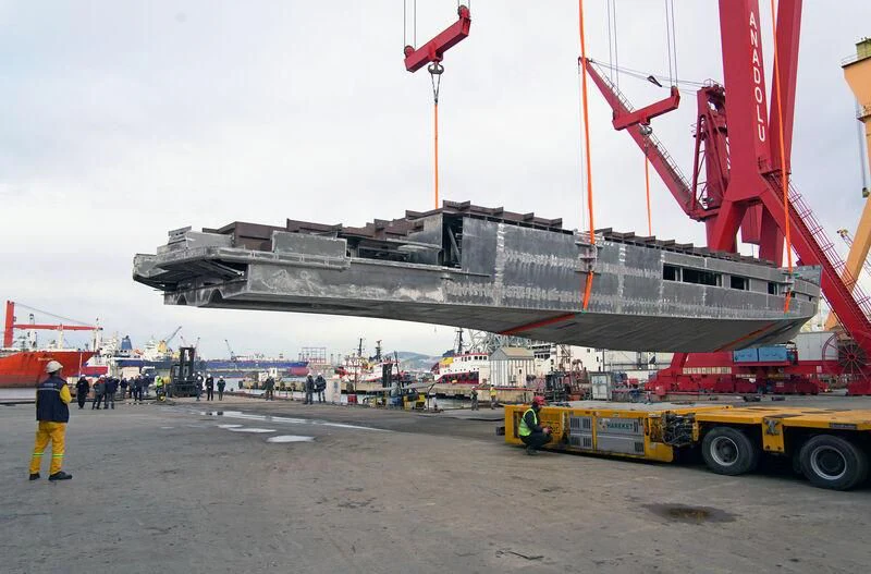 a large ship docked aboard AISHA Yacht for Sale