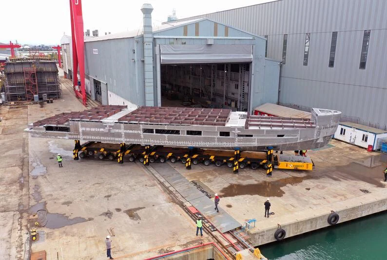 a large building with a crane aboard AISHA Yacht for Sale