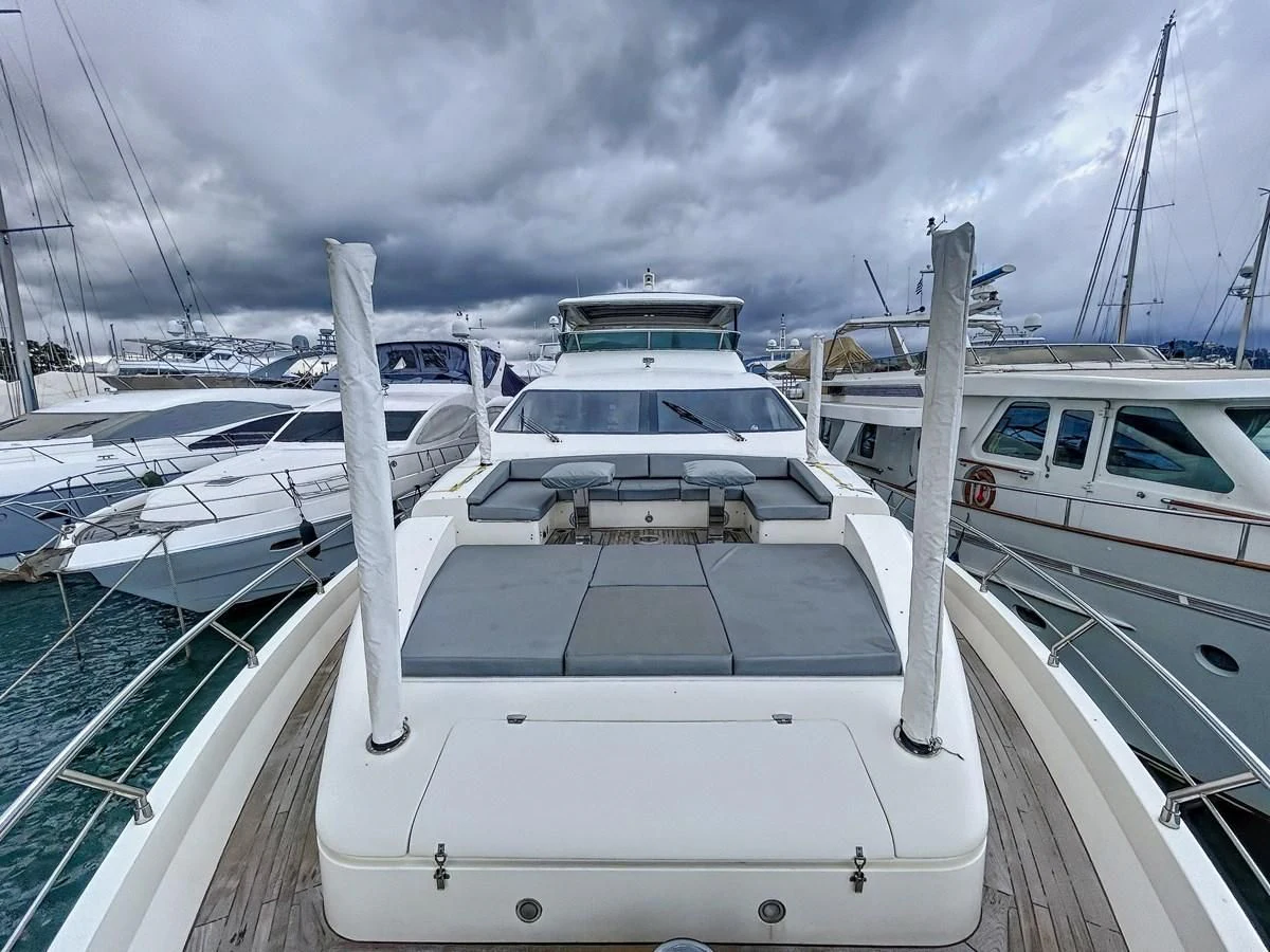 a group of boats are parked in a harbor aboard LA FENICE Yacht for Charter