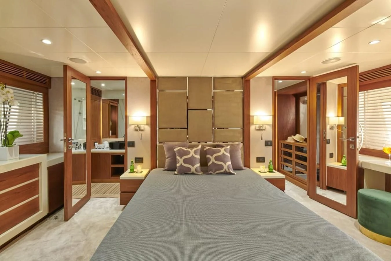 a large bedroom with a large bed aboard LA FENICE Yacht for Charter