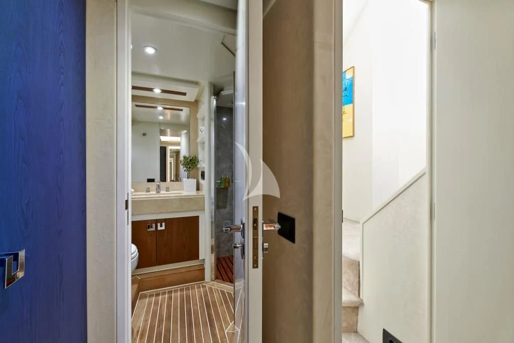 a bathroom with a sink and a mirror aboard LA FENICE Yacht for Charter