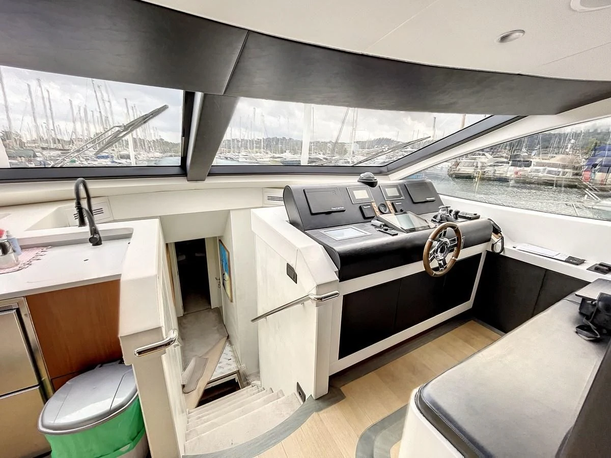a boat with a large deck aboard LA FENICE Yacht for Charter