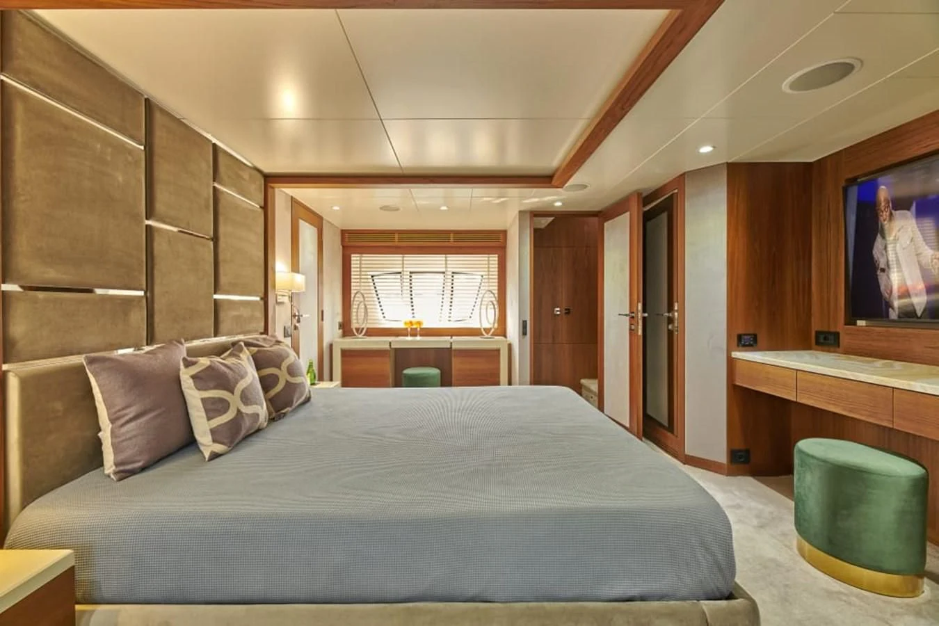 a bed in a room aboard LA FENICE Yacht for Charter