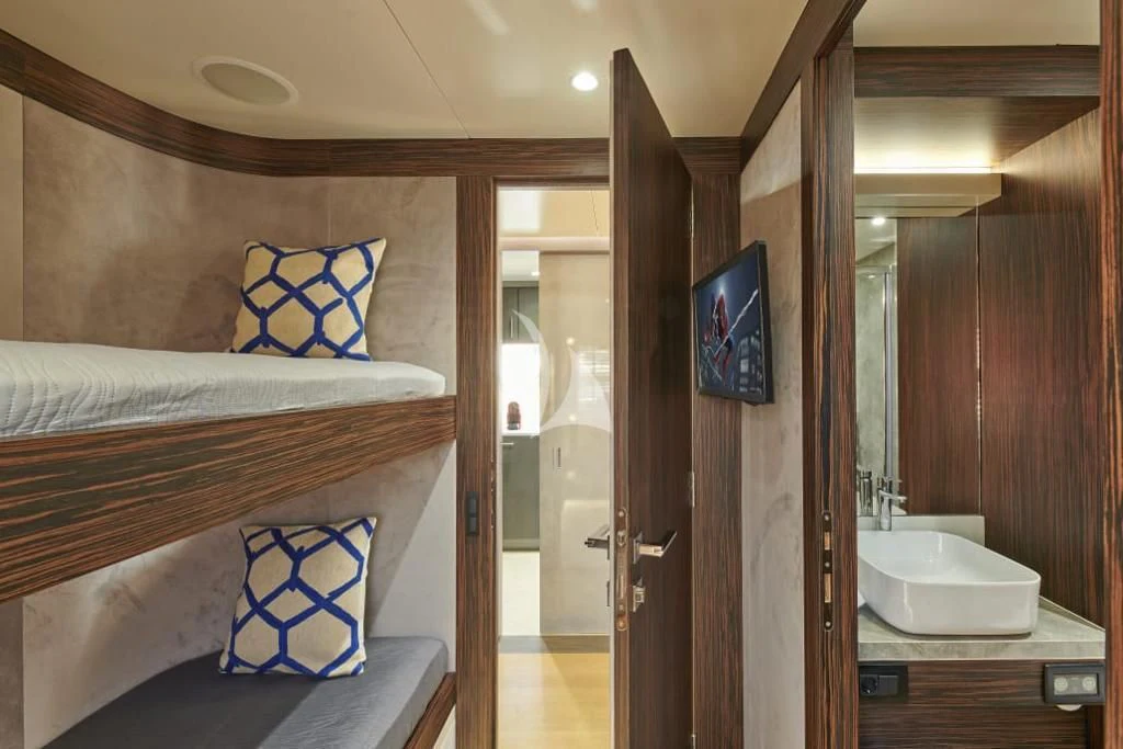 a bed in a room aboard LA FENICE Yacht for Charter