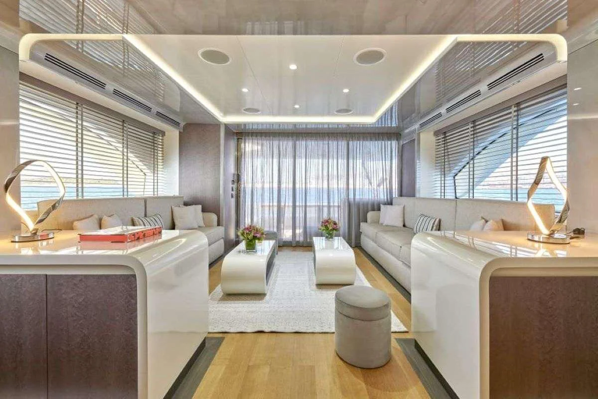 a room with a large window and a couch aboard LA FENICE Yacht for Charter