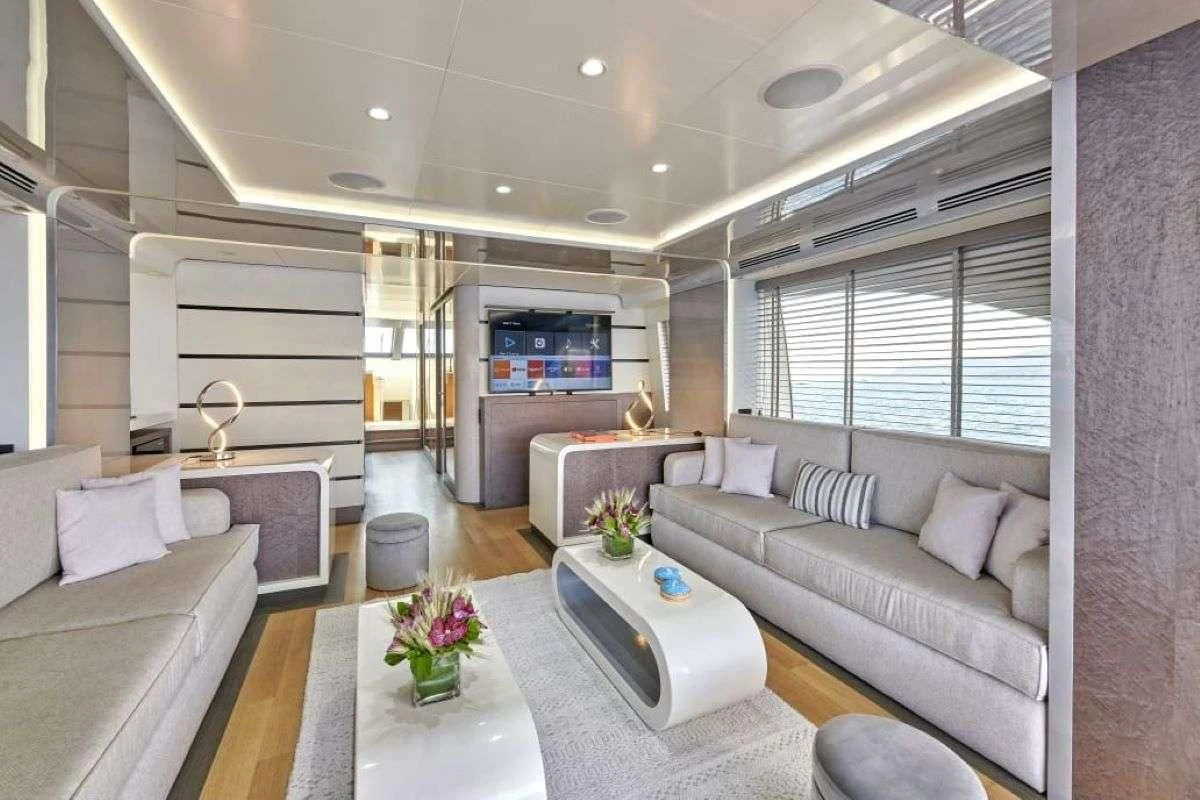 a living room with a couch and a coffee table aboard LA FENICE Yacht for Charter