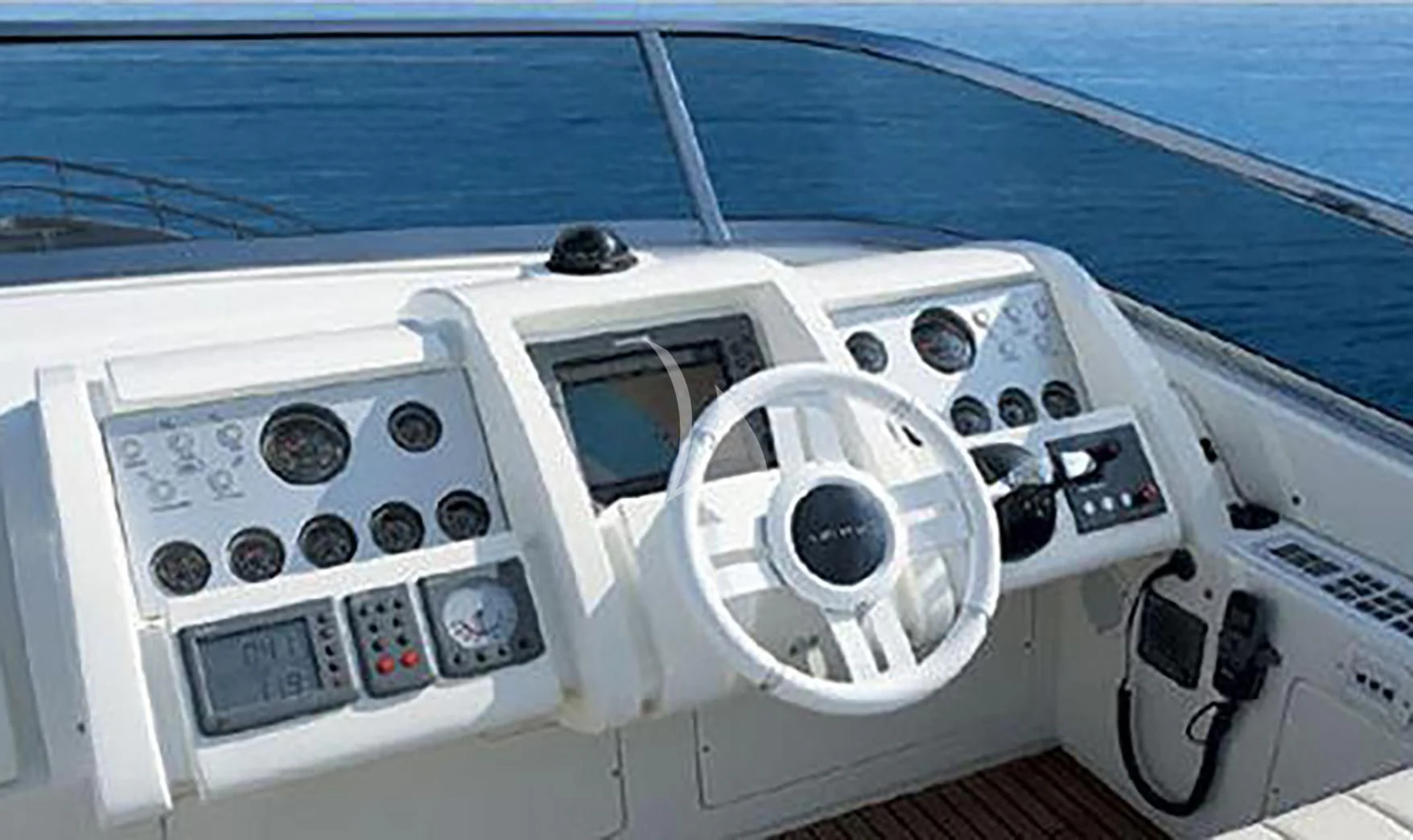 the cockpit of a white boat aboard LA FENICE Yacht for Charter