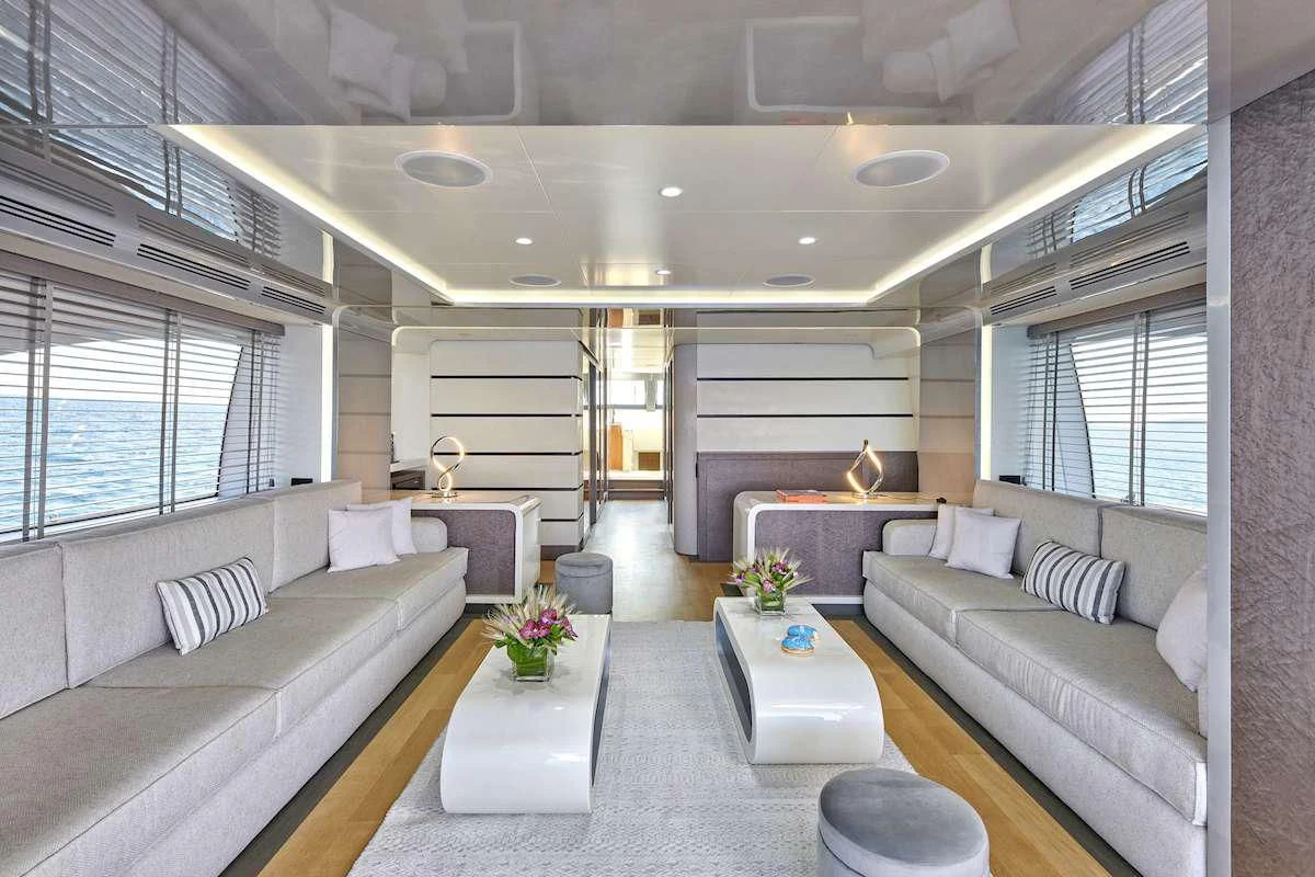 a living room with a large window aboard LA FENICE Yacht for Charter