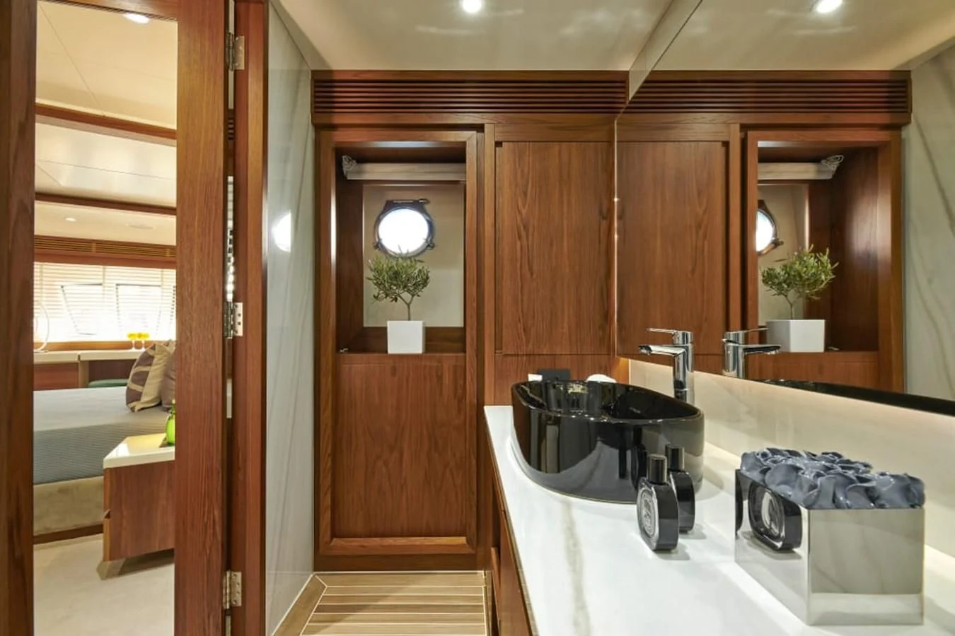 a bathroom with a sink and a mirror aboard LA FENICE Yacht for Charter