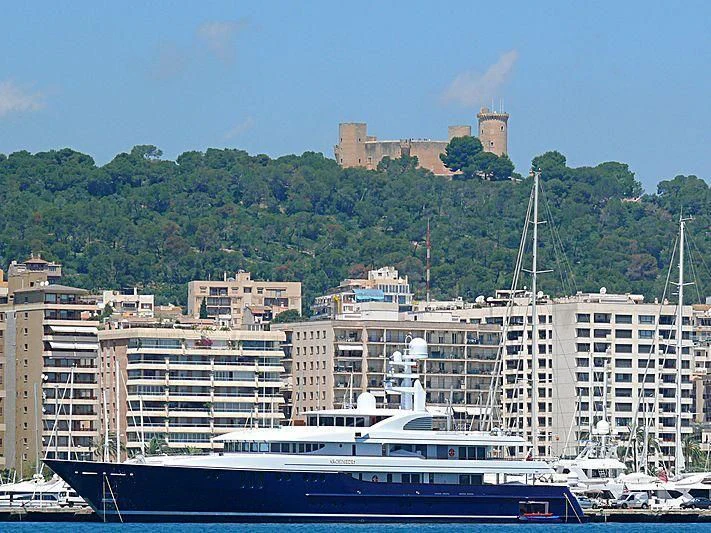 a large ship in a harbor aboard ARCHIMEDES Yacht for Sale