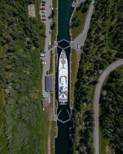 a road with cars on it aboard ARCHIMEDES Yacht for Sale