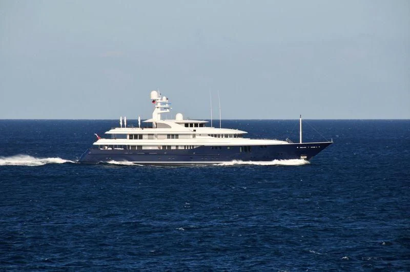 a large white boat in the water aboard ARCHIMEDES Yacht for Sale