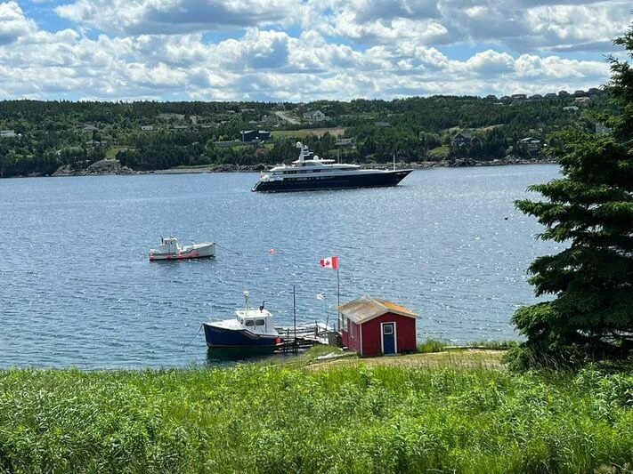 a boat on the water aboard ARCHIMEDES Yacht for Sale