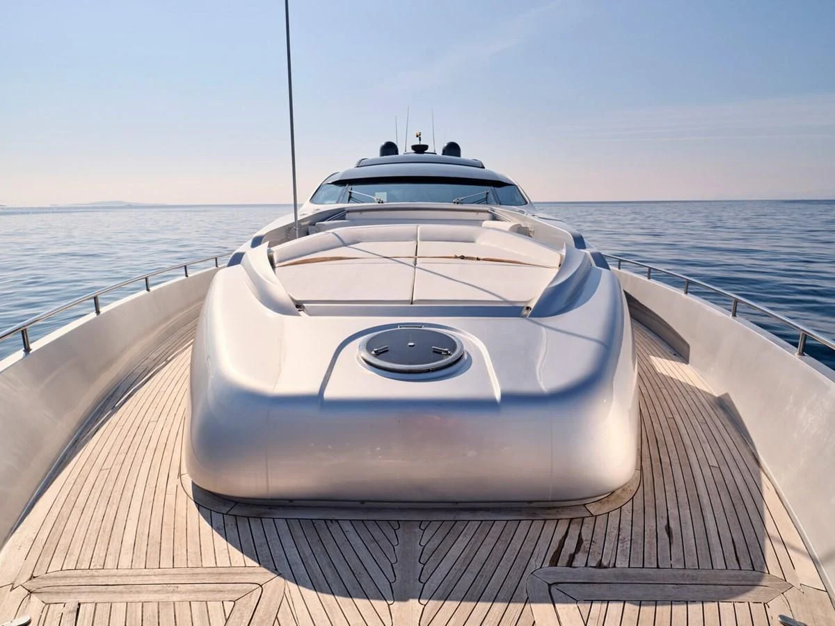 a white car on a boat aboard ONE Yacht for Charter