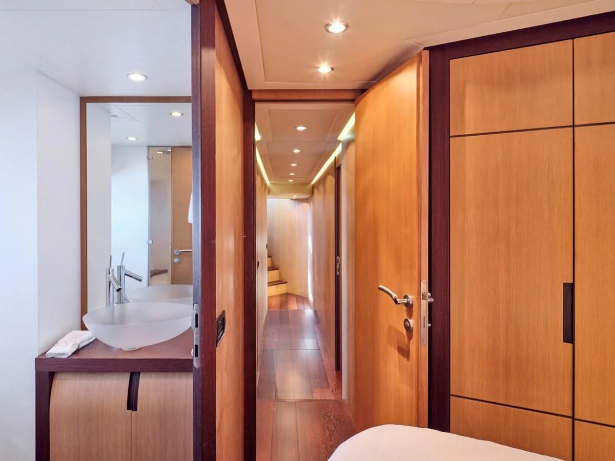 a bathroom with a sink and a mirror aboard ONE Yacht for Charter
