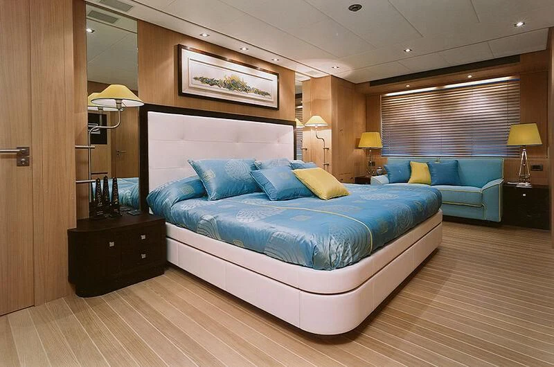 a large bed in a room aboard MARIA CARLA Yacht for Sale