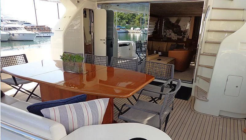 a table and chairs on a boat aboard ASTARTE Yacht for Sale