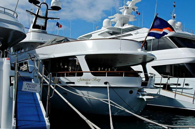 a boat docked at a pier aboard TRANQUILLITY Yacht for Sale