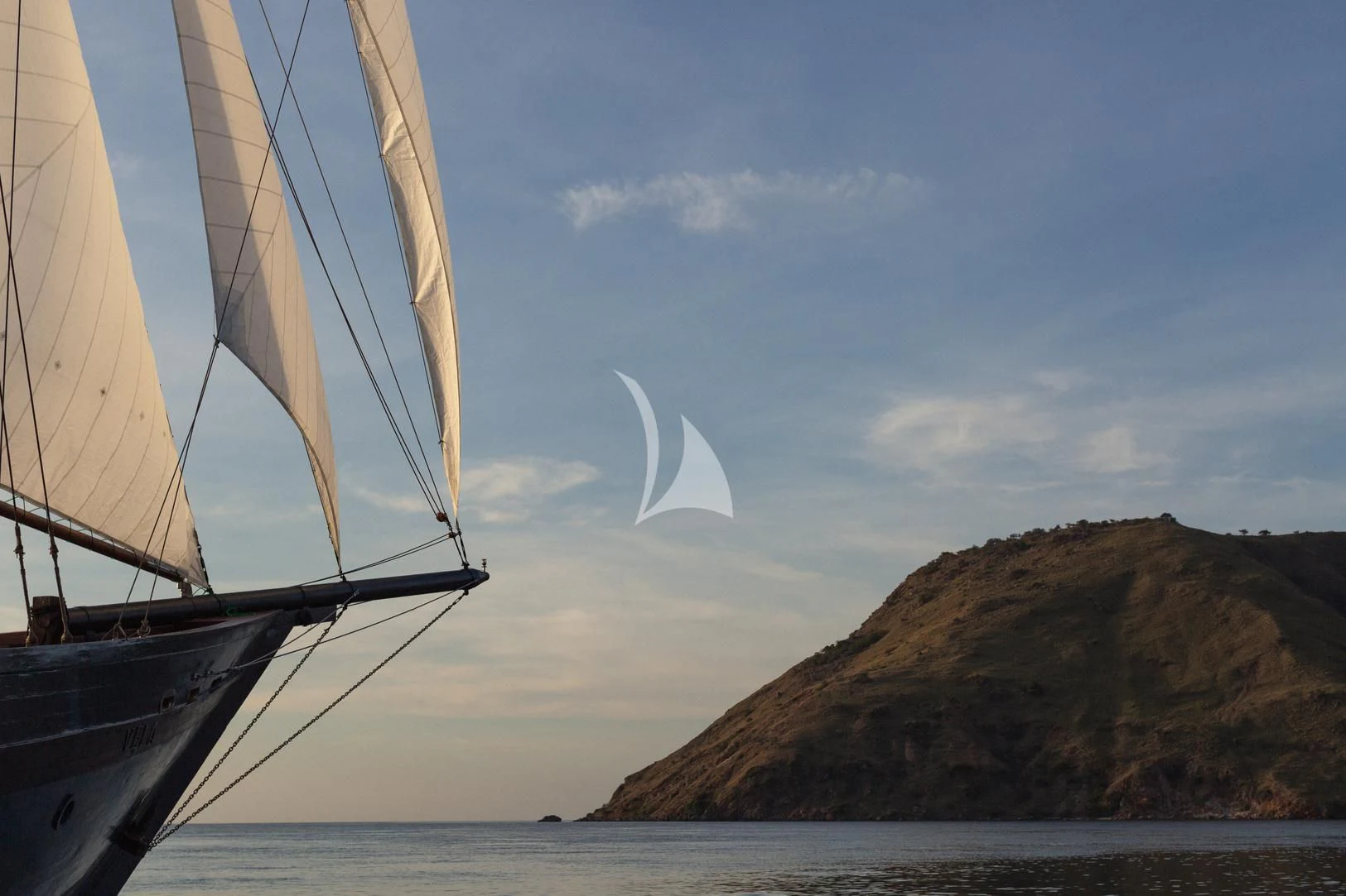 a boat on the water aboard VELA Yacht for Charter