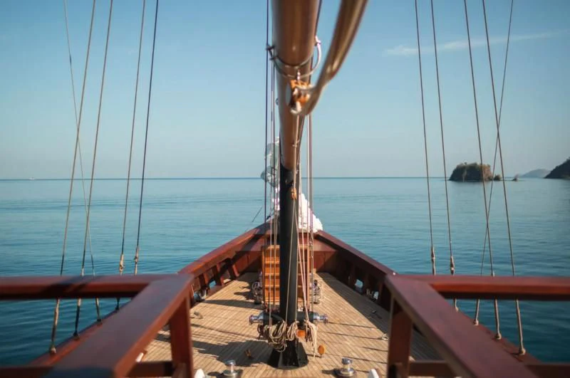 a boat on the water aboard VELA Yacht for Charter