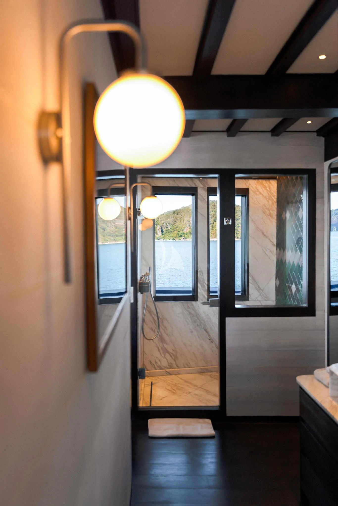 a room with a light aboard VELA Yacht for Charter