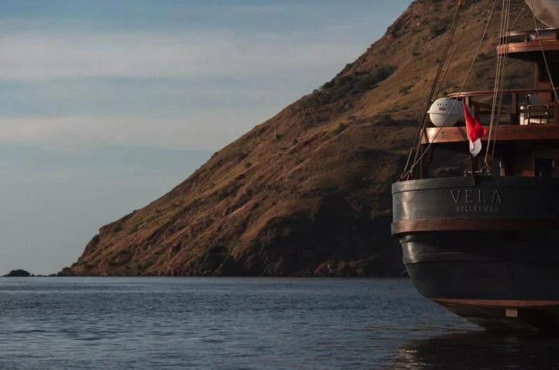 a boat on the water aboard VELA Yacht for Charter
