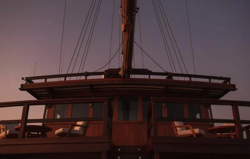 a building with a tower aboard VELA Yacht for Charter