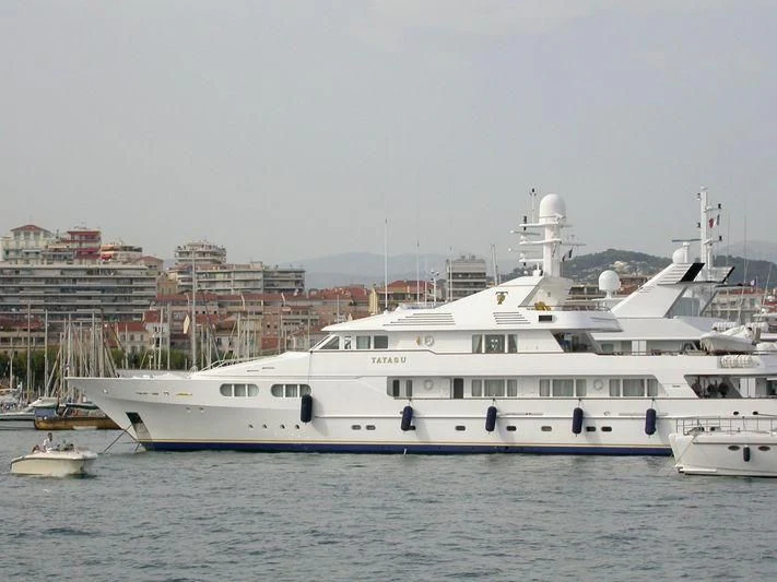 a large white boat in the water aboard TATASU Yacht for Sale