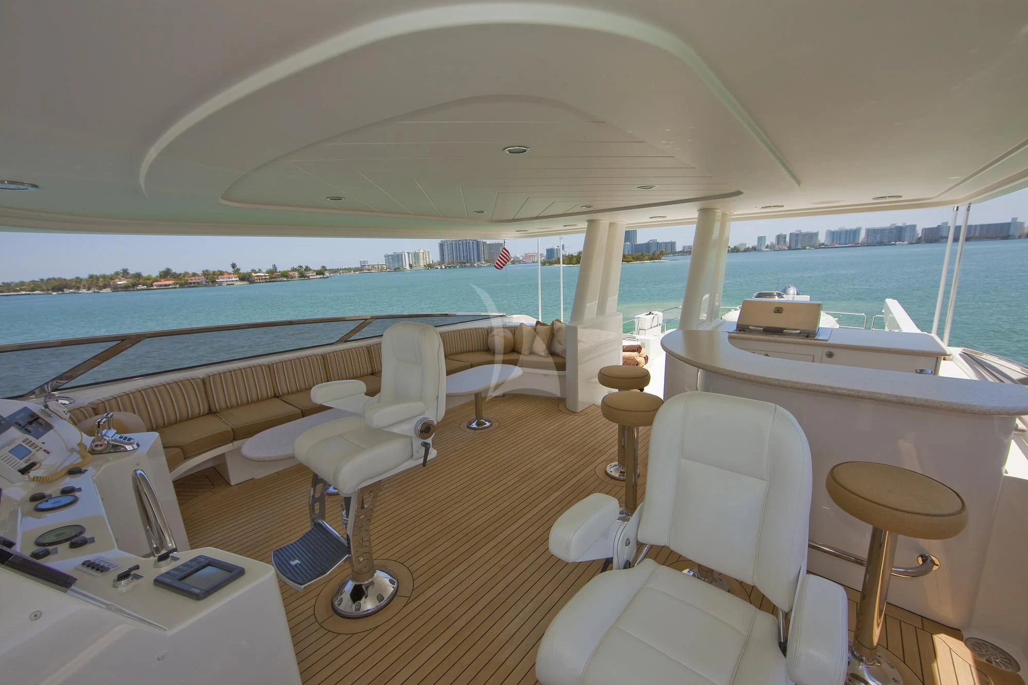 a room with a view of the ocean and the beach aboard LADY GRACE Yacht for Sale