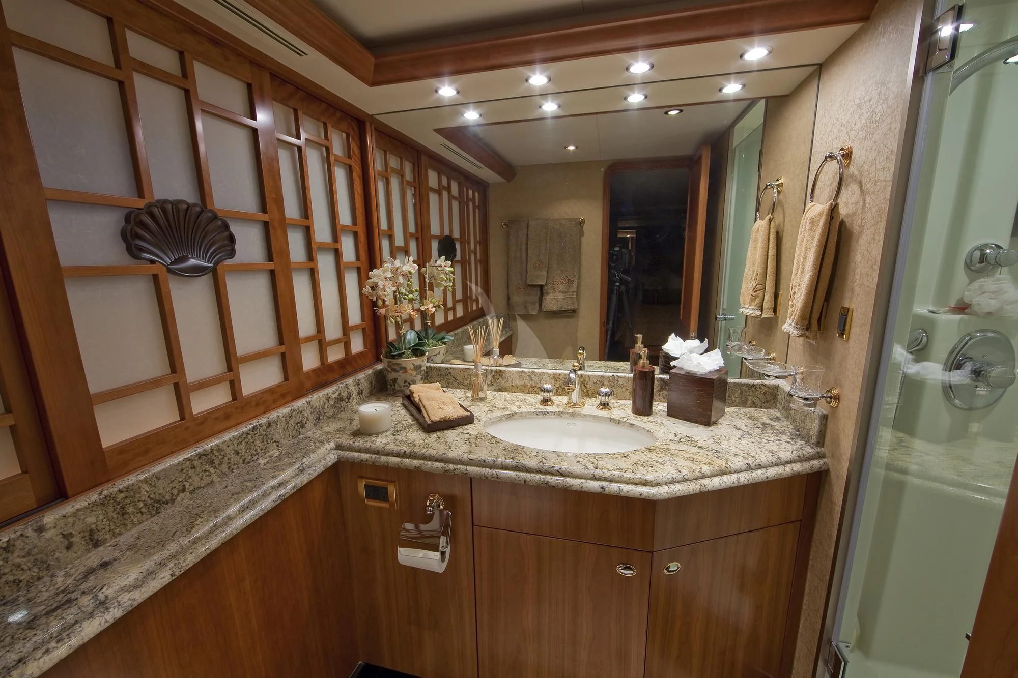 a bathroom with a large mirror aboard LADY GRACE Yacht for Sale