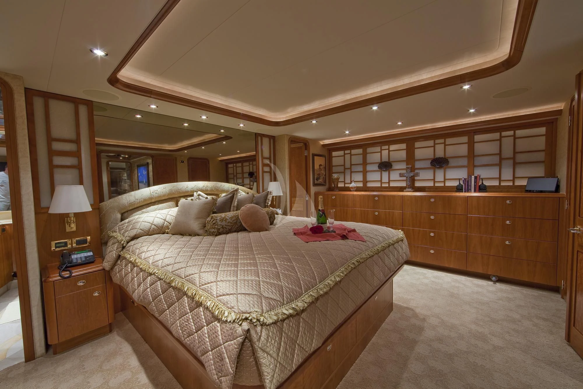 a bedroom with a large bed aboard LADY GRACE Yacht for Sale