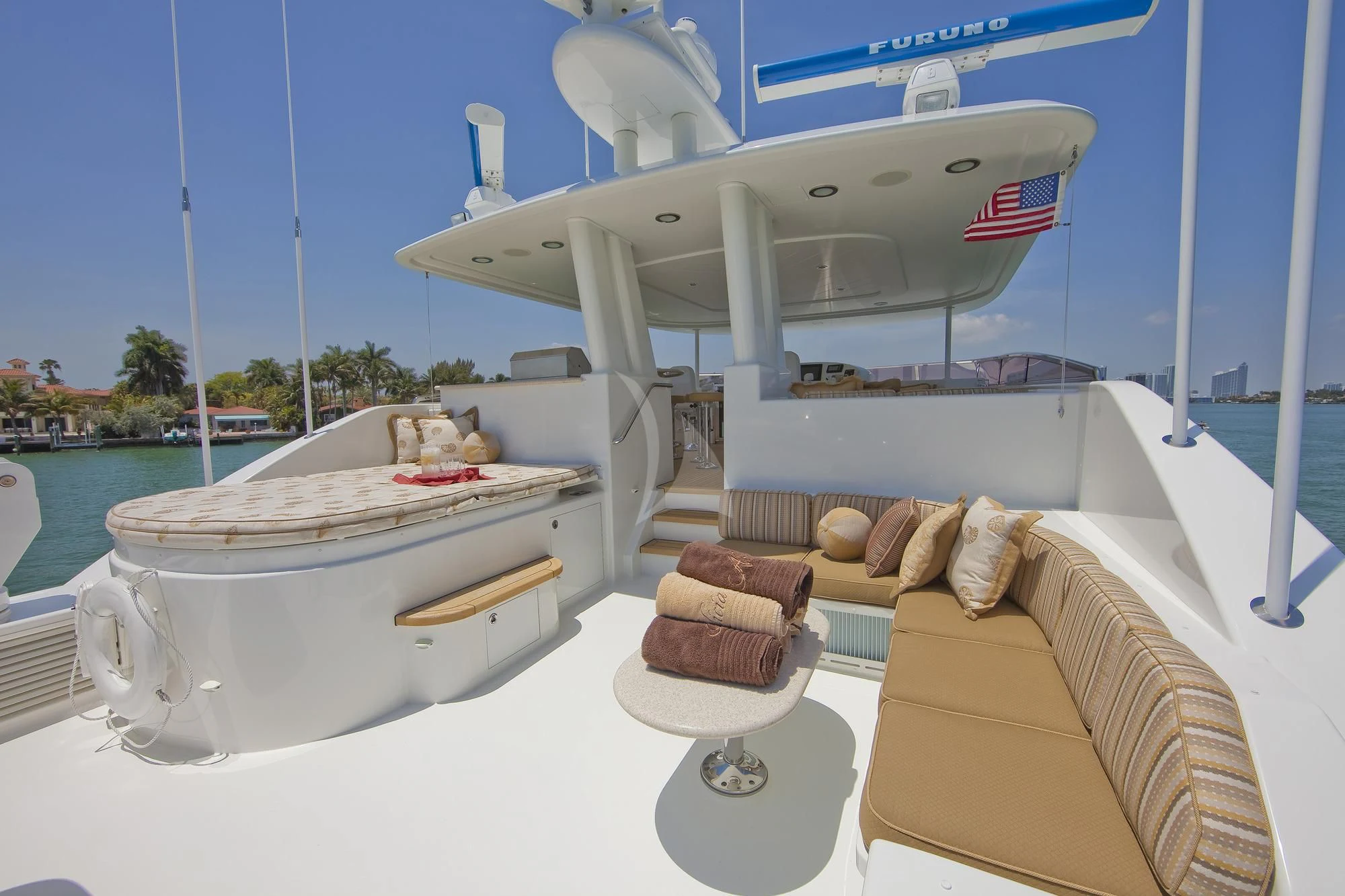 a boat with a bed and a couple of small round objects on it aboard LADY GRACE Yacht for Sale