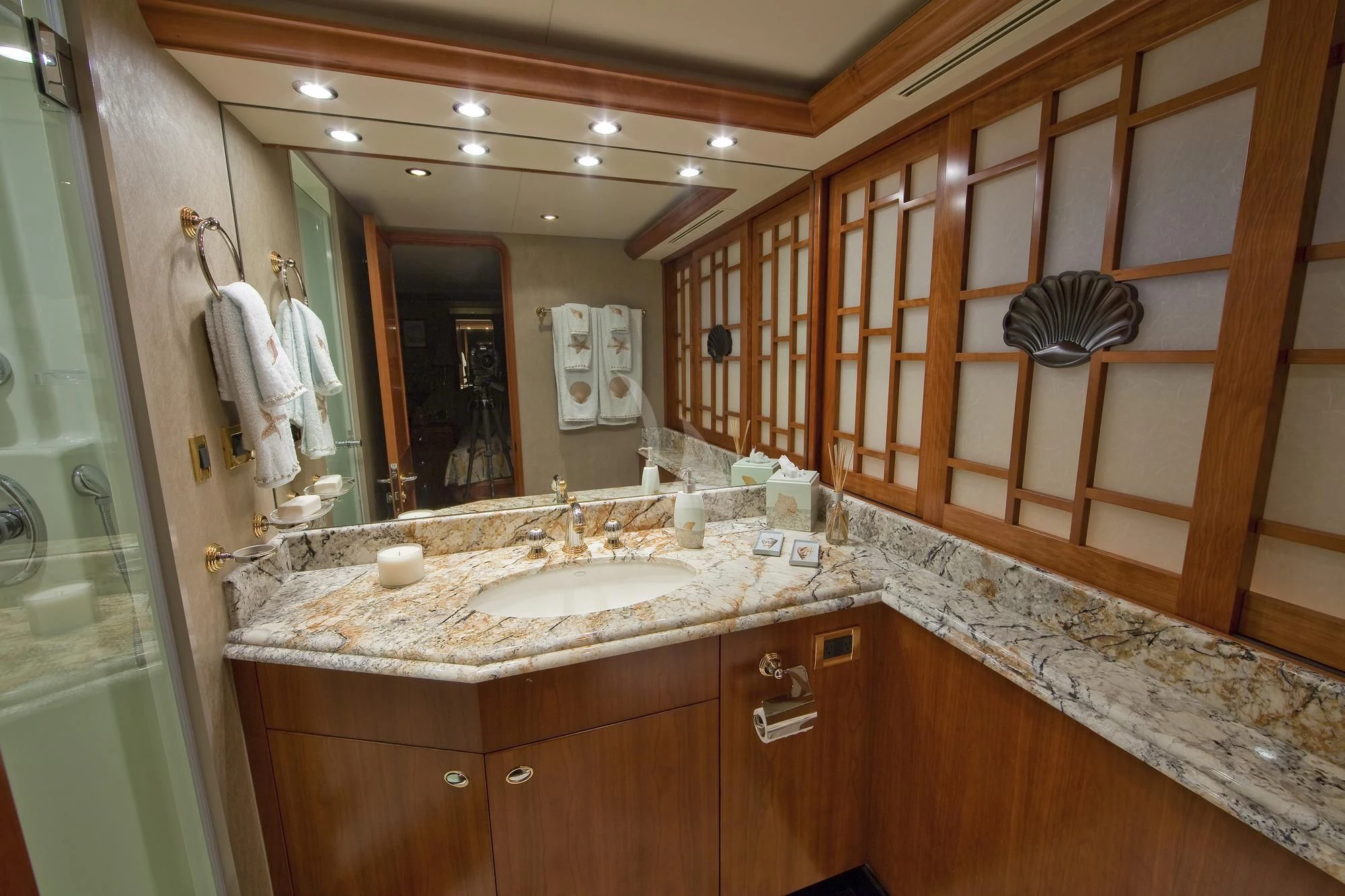 a bathroom with a large mirror aboard LADY GRACE Yacht for Sale