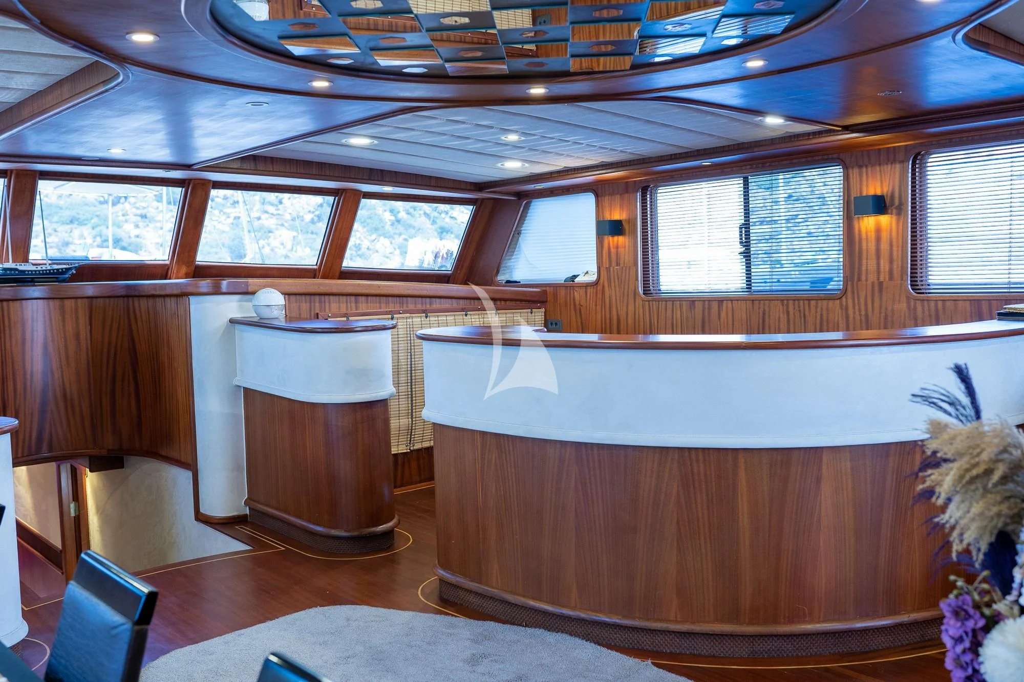 a room with a table and chairs aboard NEVRA QUEEN Yacht for Sale