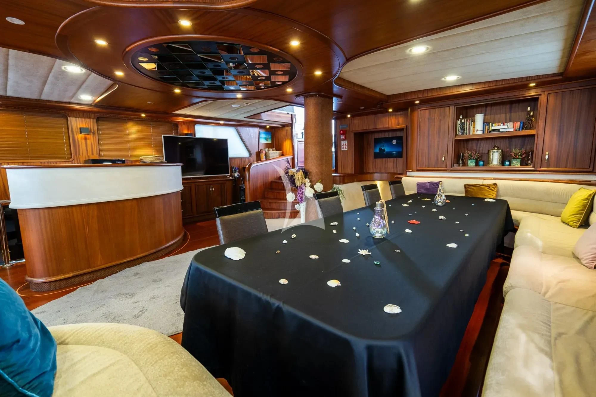 a room with a table and chairs aboard NEVRA QUEEN Yacht for Sale