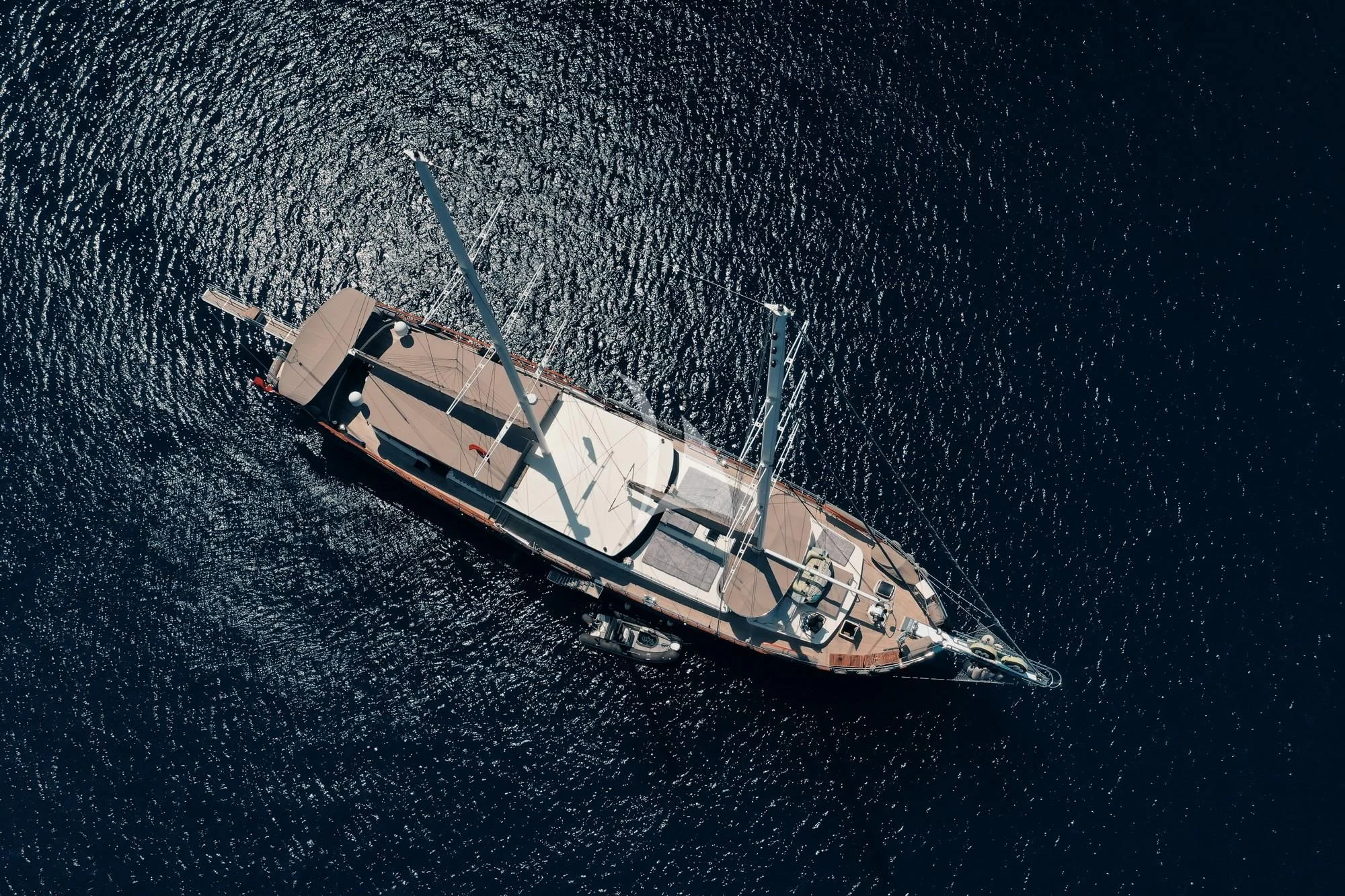 a helicopter flying over a body of water aboard NEVRA QUEEN Yacht for Sale