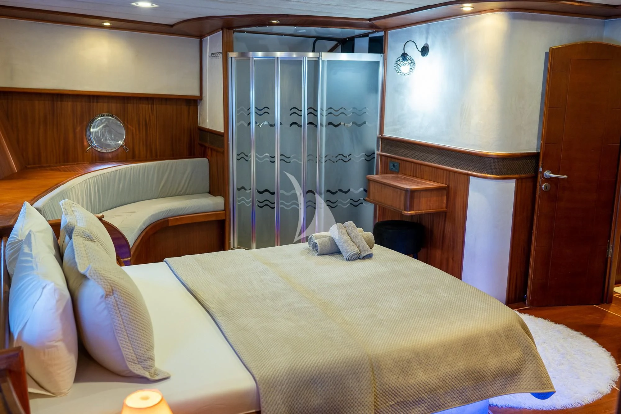 a room with a bed and a closet aboard NEVRA QUEEN Yacht for Sale