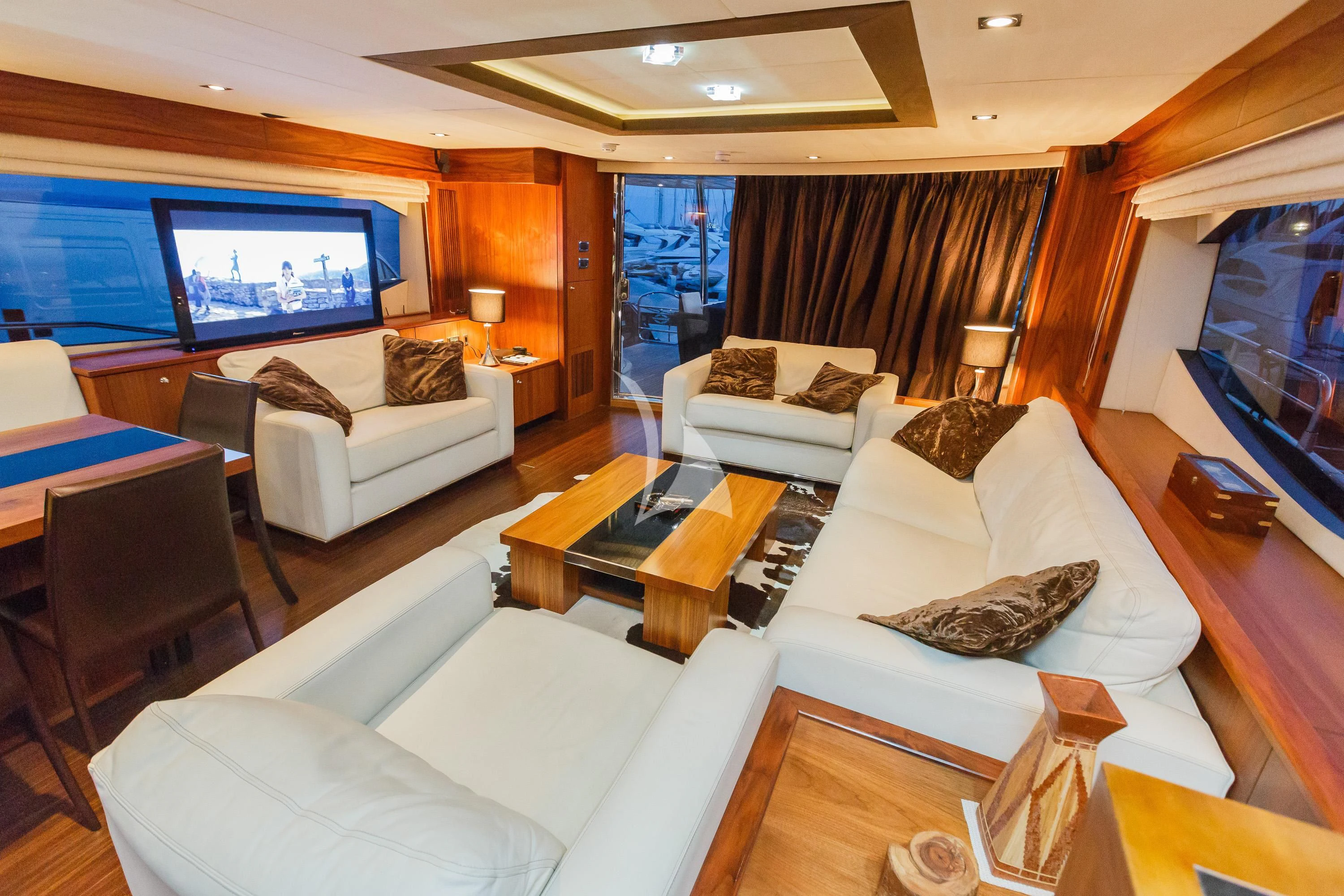 a living room with a large screen aboard THE BEST WAY Yacht for Sale